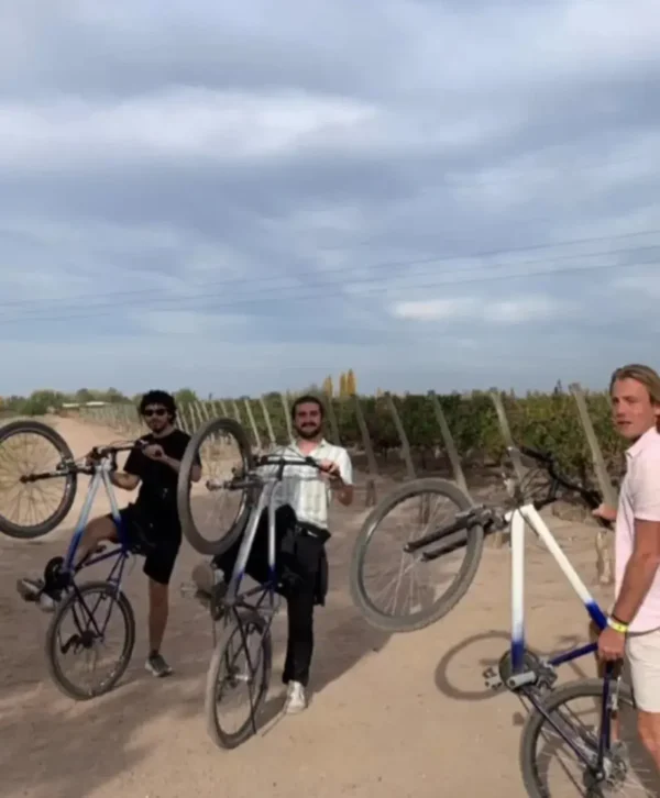 Friends enjoying a self-guided bike tour along the Maipú Wine Route with Maipu Bikes in Mendoza, Argentina.