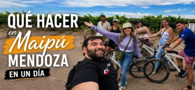 Grupo de turistas recorriendo en bicicleta los viñedos de la Ruta del Vino de Maipú, Mendoza